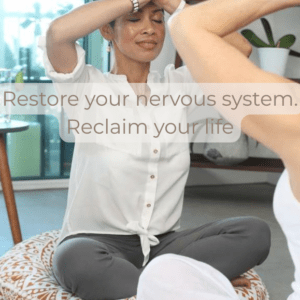 Yoga for Fibromyalgia: A woman practicing mindful body awareness and gentle movements as taught in the guide by Froydis Karlsen.